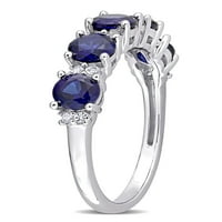 1- Carat T.G.W. Létrehozta a Blue Sapphire -t és létrehozta a fehér zafír ezüst évforduló gyűrűt