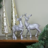 Ezüst csillogó poros rénszarvas karácsonyfigurák halmaza